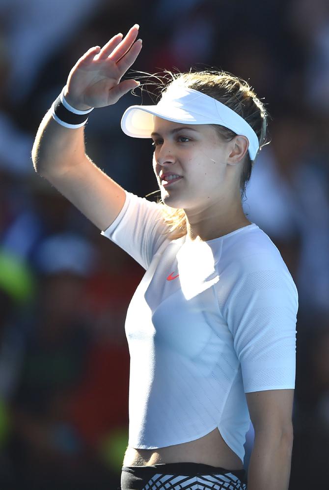 Eugenie Bouchard of Canada celebrates her victory over Peng Shuai of China in their women