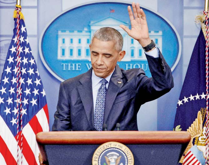 USâu00c2u0080u00c2u0088President Barack Obama gestures at the conclusion of his final presidential news conference. Pic/PTI