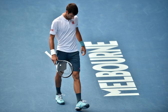 Novak Djokovic reacts after a point against Denis Istomin during their second round match of the Australian Open. Pic/ AFP