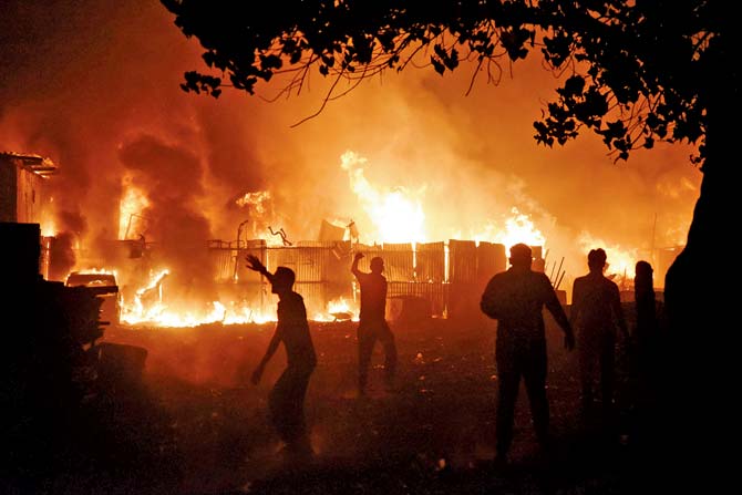The fire that broke out inside a scrap market in Kurla, CST Road, in the early hours today