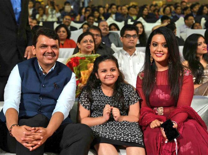 Photos: Divija makes an appearance with father Devendra Fadnavis