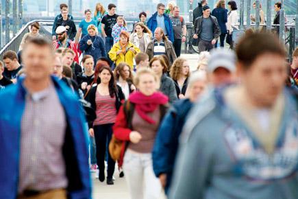 German population hits record high of 82.8 million due to migrants