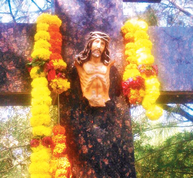 The decimated statue of Jesus Christ at Carter Road