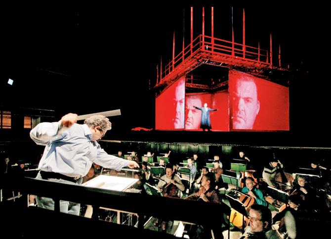 conducts the orchestra for the opera, The Flying Dutchman. Pic courtesy/Neil Bennett