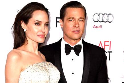 What happened during Angelina Jolie and Brad Pitt's plane flight?