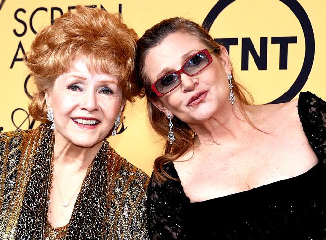 Debbie Reynolds and Carrie Fisher. Pic/AFP