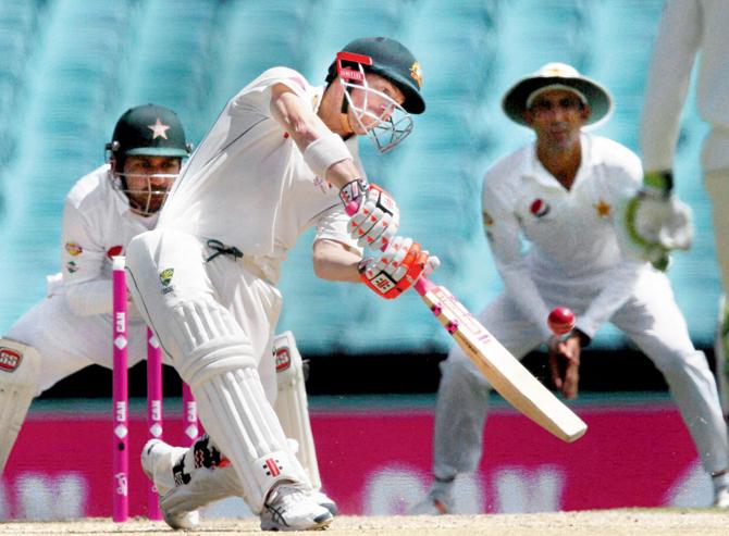 Australia’s David Warner hits one on the off side against Pakistan  on Day Four of the third Test in Sydney yesterday. Pic/PTI