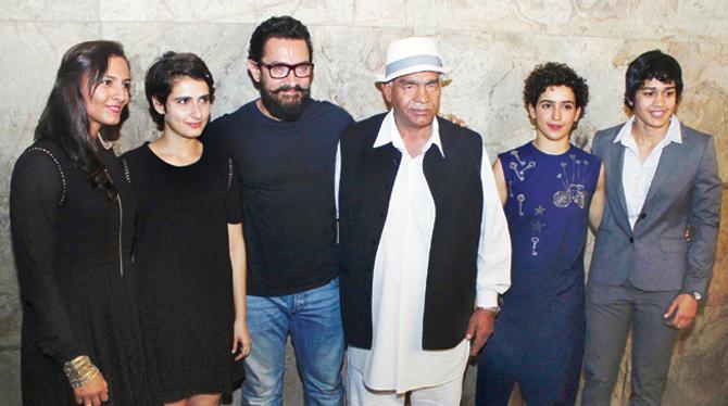 The Dangal cast with the Phogats on whose life the film is based