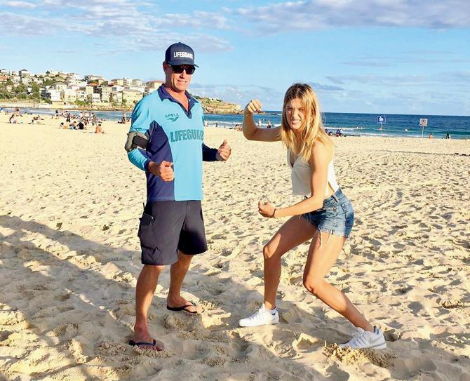 Eugenie Bouchard posted this picture with a lifeguard at Bondi beach on Instagram recently