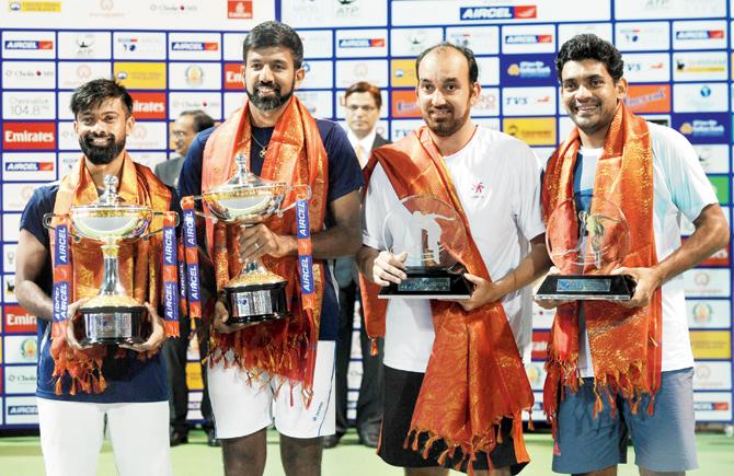 Jeevan Nedunchezhiyan (extreme left), Rohan Bopanna, Purav Raja and Divij Sharan  with their trophies in Chennai  yesterday. Pic/AFP