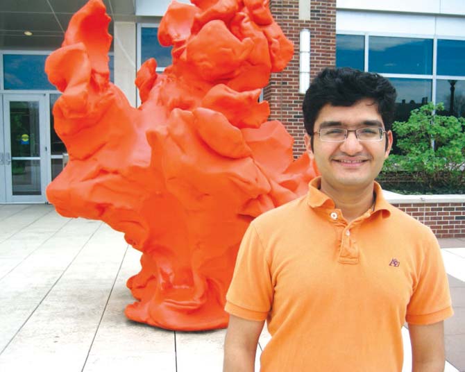 Bhushan Mahadik in 2012 outside Dr Harly’s Lab where he is a research associate