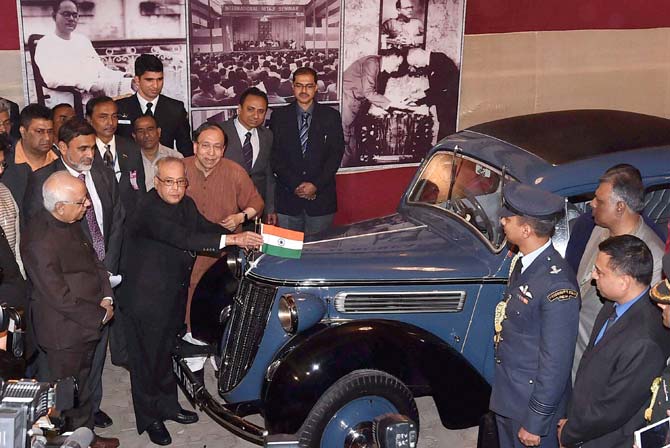 President Pranab Mukherjee having a look of the historic Wanderer Car in which Sisir Kumar Bose drove Netaji Subhas Chandra Bose on his Great Escape in January 1941, at Netaji Bhavan in Kolkata on Wednesday. Pic/PTI