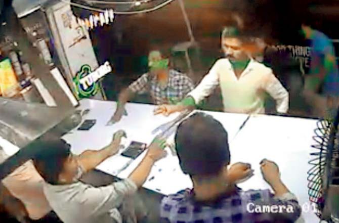 A CCTV grab that shows Kamlesh at a liquor shop on the day of the incident