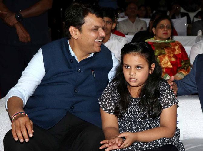 Photos: Divija makes an appearance with father Devendra Fadnavis