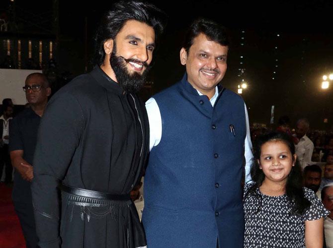 Photos: Divija makes an appearance with father Devendra Fadnavis