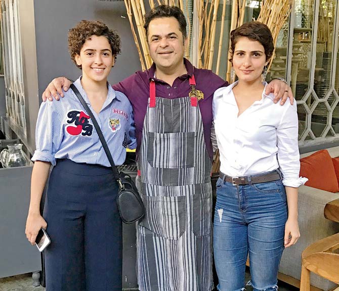 Fatima Sana Shaikh (right) and Sanya Malhotra with chef Vicky Ratnani