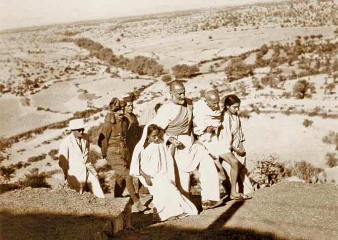 (From right to left) Dr Sushila Nayar, Mahatma Gandhi, Khan Abdul Ghaffar Khan, Amtus Salam and others walking in the countryside of North West Frontier Provinces, October 1938