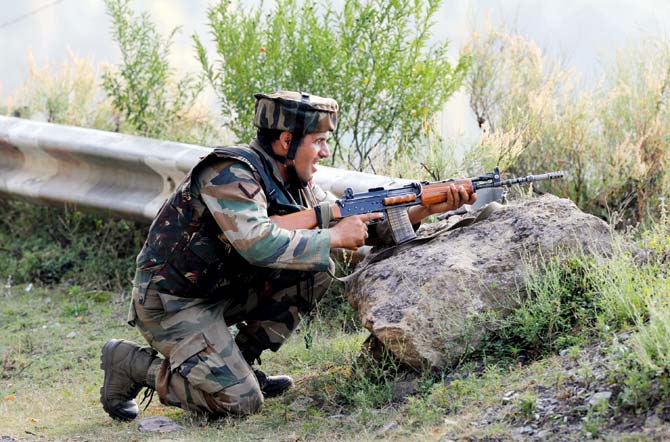 A jawan takes position during the Uri attack. File picture