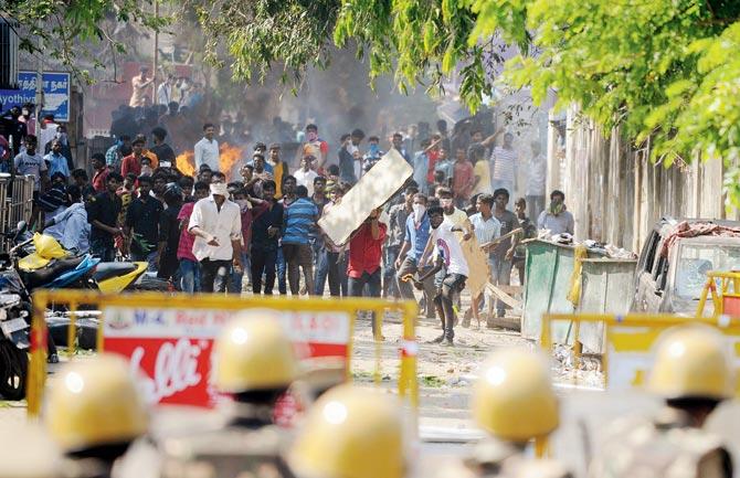 Violent scenes were seen not just at Marina Beach, but other places in Chennai. The violence also spread elsewhere in the state. Pics/PTI