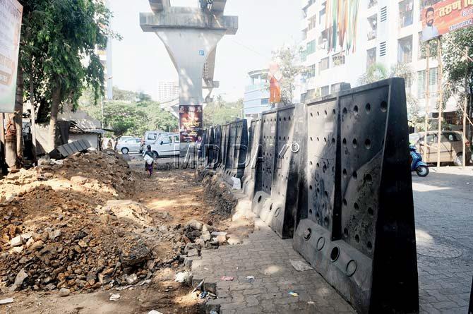 Monorail construction leaves motorists and pedestrians in Parel village in a limbo. Pic/Datta Kumbhar