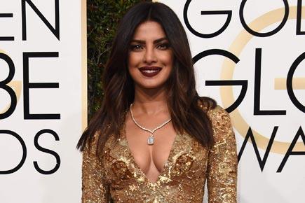 Priyanka Chopra 'glitters' in a gold gown at Golden Globe Awards 2017