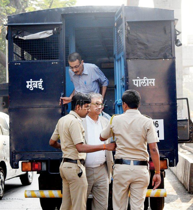 Police escorted Peter Mukerjea and Sanjeev Khanna