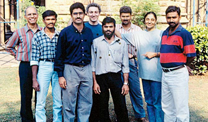 Vikas DilawariâÂu00c2u0080Âu00c2u0088(third from left) with the team while working at the Rajabai Tower 
