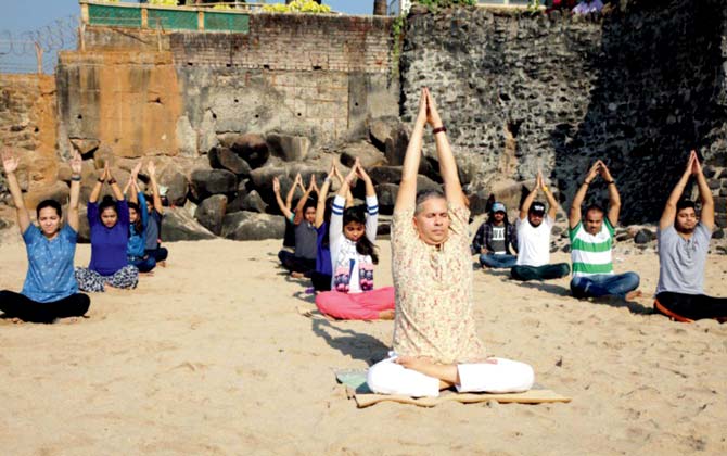 A recent yoga session at Juhu beach