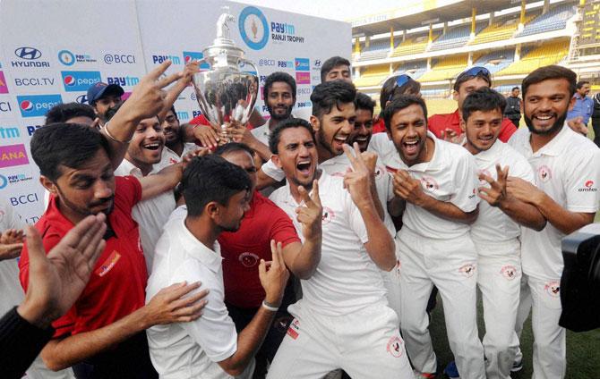  Gujarat players celebrating their victory over Mumbai in the Ranji Trophy final 2016-2017 at Holkar Stadium, in Indore on Saturday. PTI 