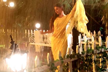 Ooh La La! 'Naagin' actress Mouni Roy oozes oomph in a wet yellow sari