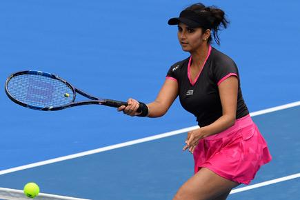 Sania Mirza advances, Rohan Bopanna beaten in Australian Open
