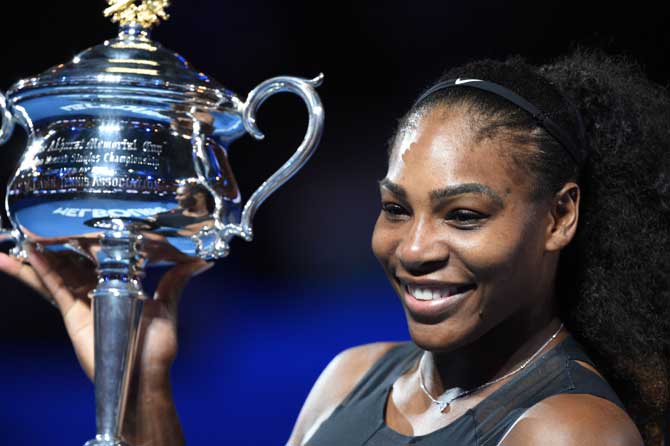 Serena Williams with the Australian Open trophy