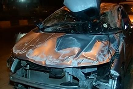 Mumbai: Speeding car overturns after hitting divider in Worli