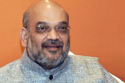 BJP President Amit Shah pays courtesy visit to city RSS leaders