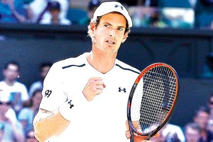 Wimbledon: Andy Murray floors Dustin Brown