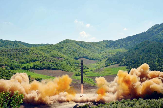 The test-fire of the intercontinental ballistic missile Hwasong-14