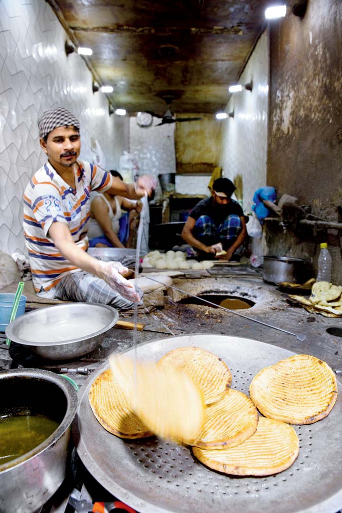 Baqerkhani roti being prepared in old city. Made with wheat kneaded in milk, ghee and sugar, these rotis are slightly heavier to digest, but can be stored for days