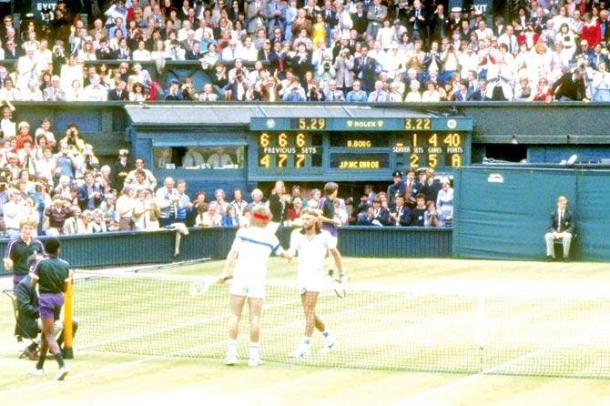 Bjorn Borg and John McEnroe shake hands after a match at Wimbledon.  Pic/Getty Images