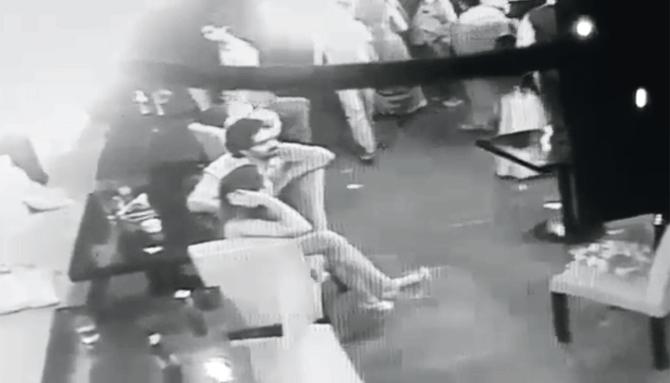 Grabs from the CCTV that show the thief stealing the purse