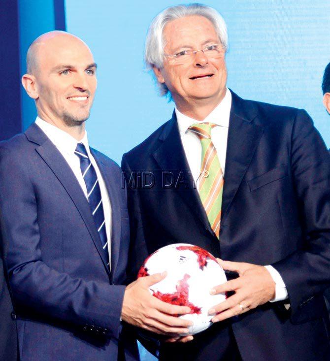 Argentina legend Cambiasso (left) with India U-17 coach Matos at the FIFA WC draw yesterday