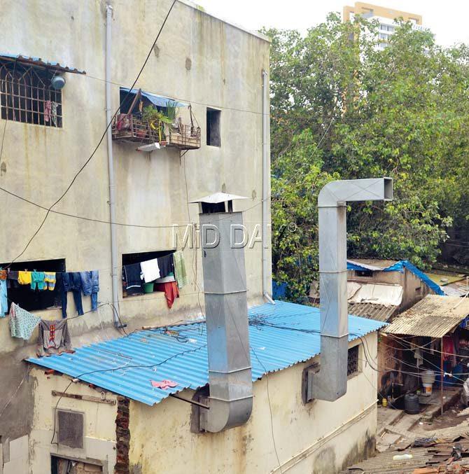 Towering chimneys keep billowing hot air into homes of second-floor residents. Pics/Datta Kumbhar
