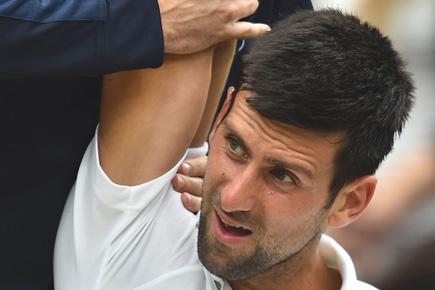 Wimbledon: Novak Djokovic retires after injury, ponders long break