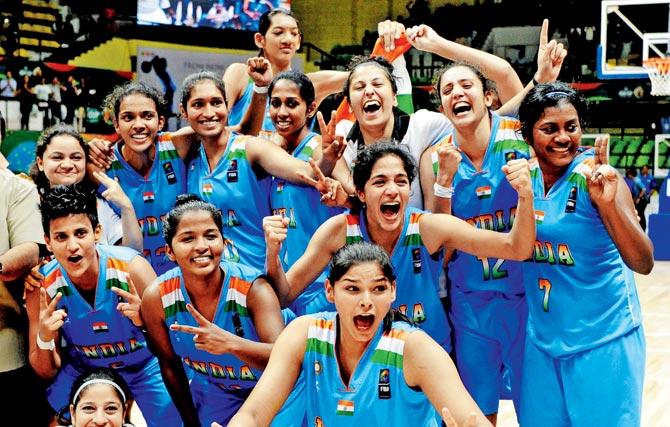 The Indian team celebrate their win in Bangalore on Saturday. Pic/PTI