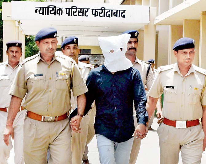 The main accused in the lynching case, was produced in the district court Faridabad yesterday. Pic/PTI