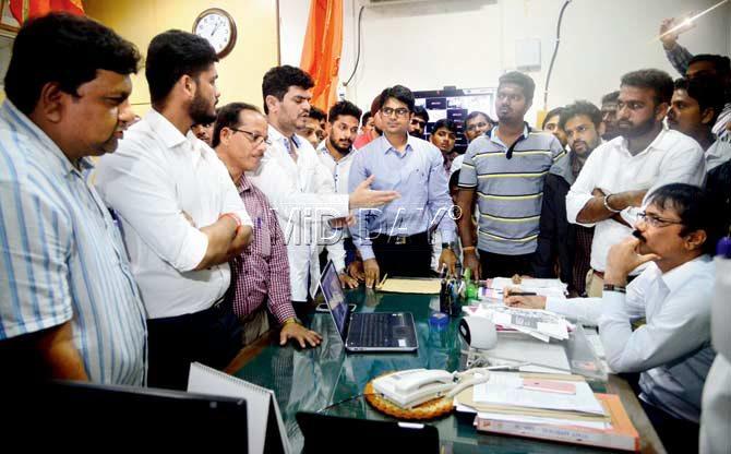 Yuva Sena members meet BB Chavan in his Charni Road office on Monday. Pic/Suresh Karkera
