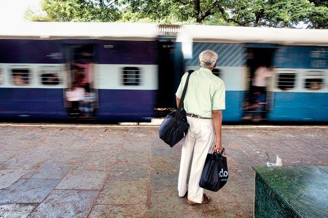Karam Bele, a retired employee of Bank of India travels regularly on the Konkan line between Mumbai and Roha to see his son who works there