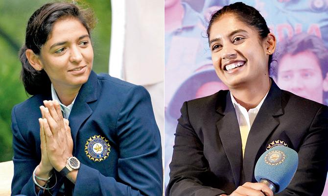 World Cup stars Harmanpreet Kaur (left) and Mithali Raj during a felicitation function in New Delhi yesterday. Pics/PTI