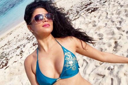 Kavita Kaushik poses in bikini and silences her detractors in one post