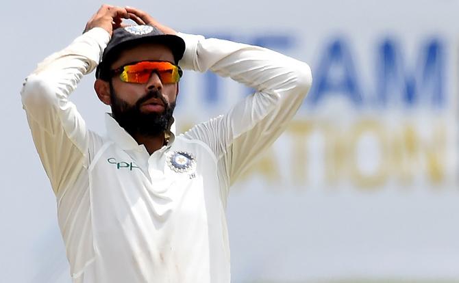 Indian cricket team captain Virat Kohli reacts during the fourth day of the first Test match between Sri Lanka and India at Galle International Cricket Stadium in Galle on July 29, 2017. Pic/AFP