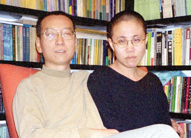 Liu Xiaobo (L) and his wife Liu Xia in 2002. Pic/AFP